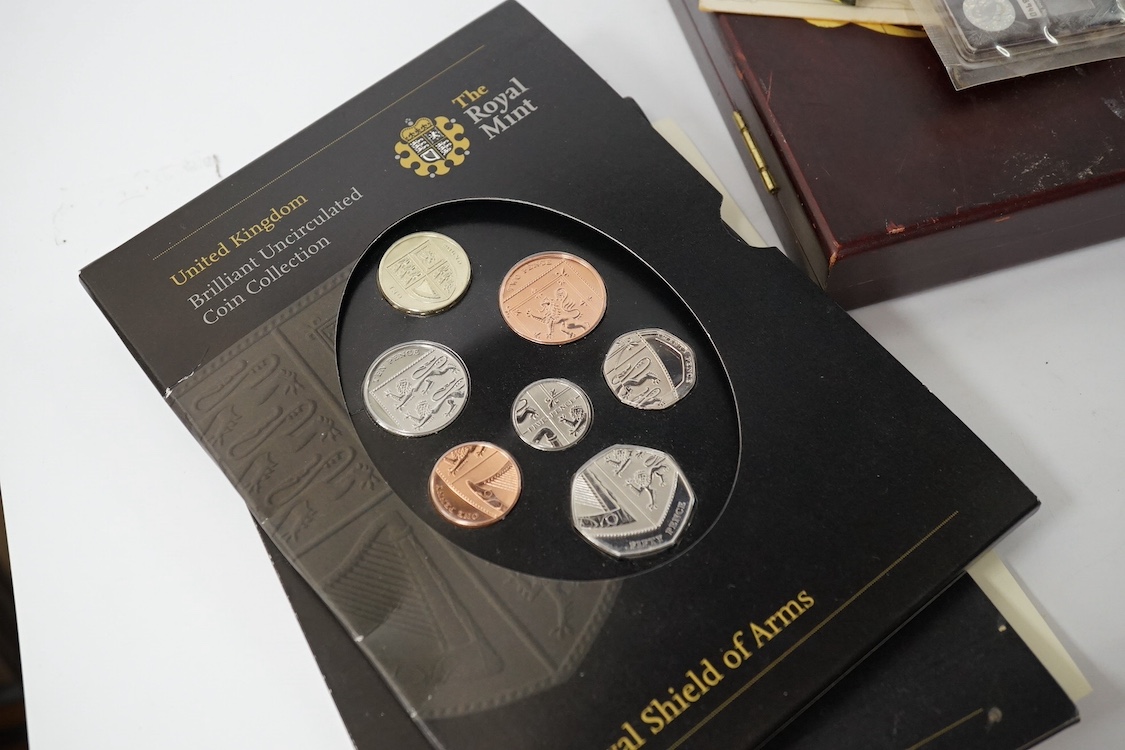 A Service Medal of the Order of St John’s with two clasps, together with a United Kingdom brilliant uncirculated coin collection 2008, plus a few other items. Condition - fair.